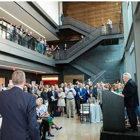 People listening to a guest speaker